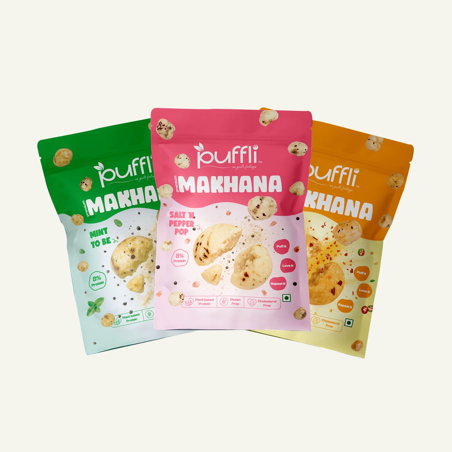 Three colorful packages of puffli Makhana snacks on a white background